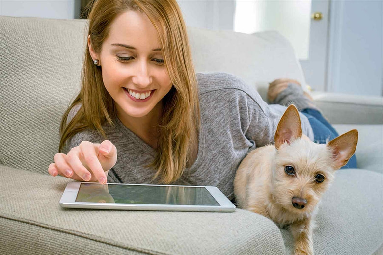 iPad and lady with dog