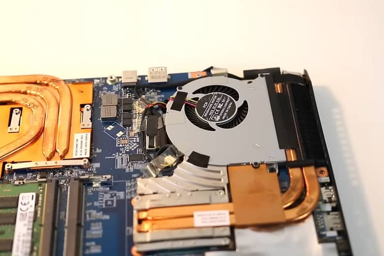 opened laptop - repairs howing internal components with cpu, heatsink, ram modules
